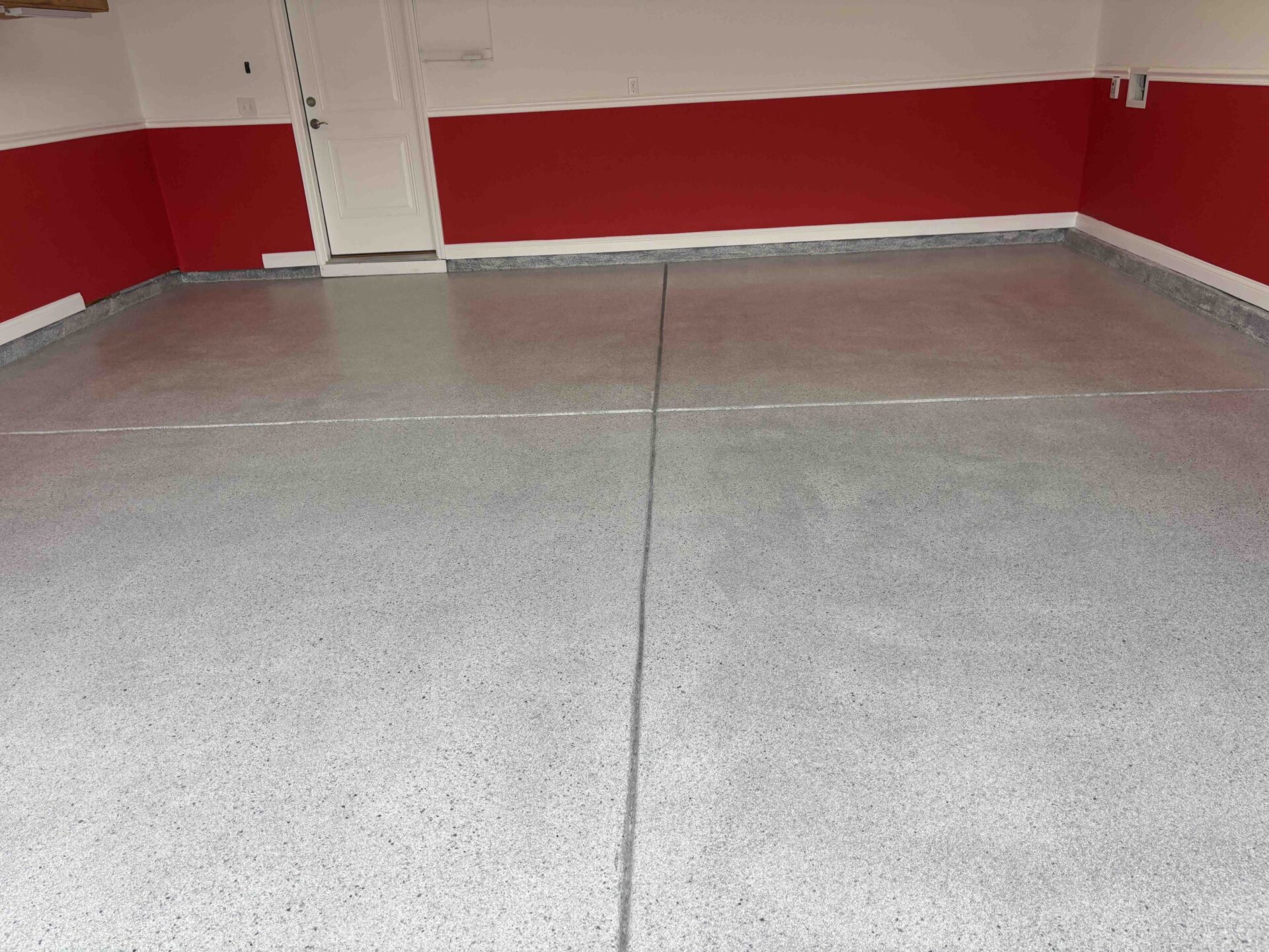 Garage Floor Coating in Calabash after a new polyaspartic coating in the color onyx by Hello Garage