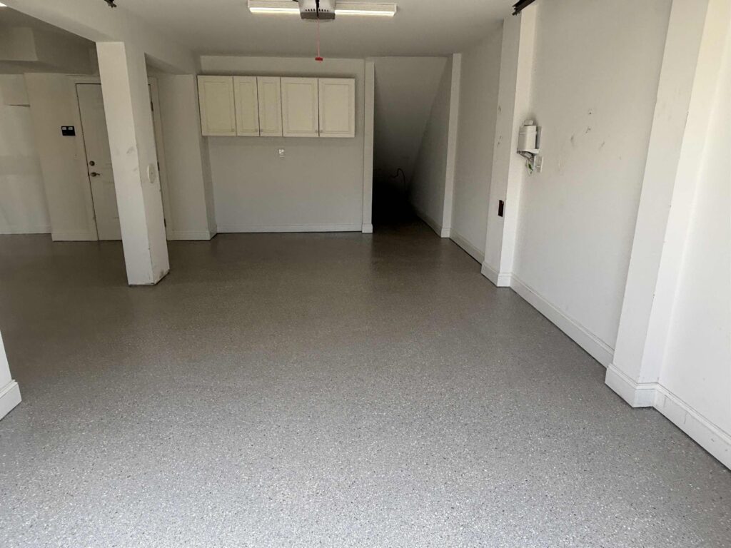 after photo of a garage floor coating project in carolina beach