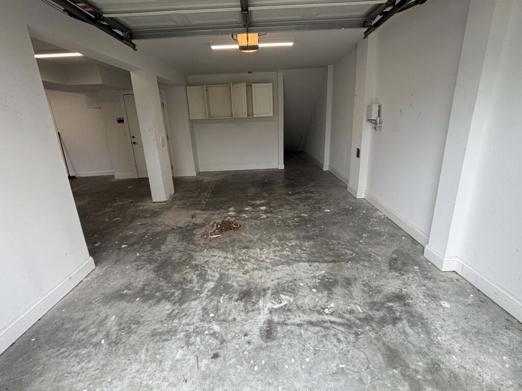 Before photo of a garage floor coating in carolina beach