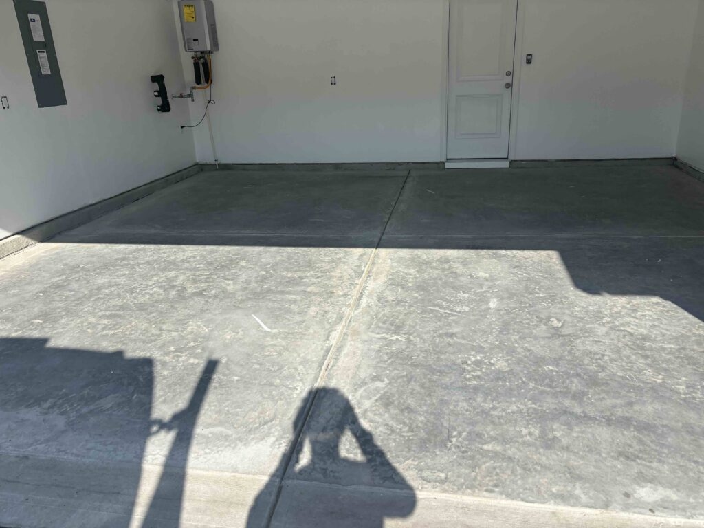 Before photo of garage floor coating in Leland