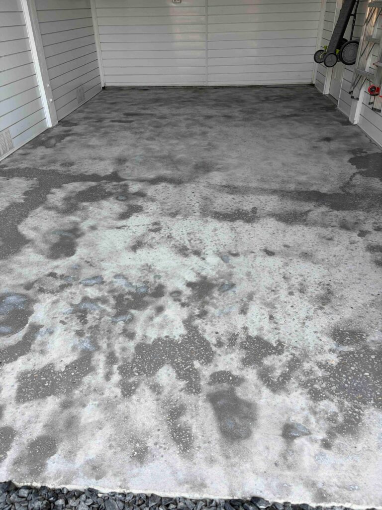 before garage floor coating job in Ocean Isle