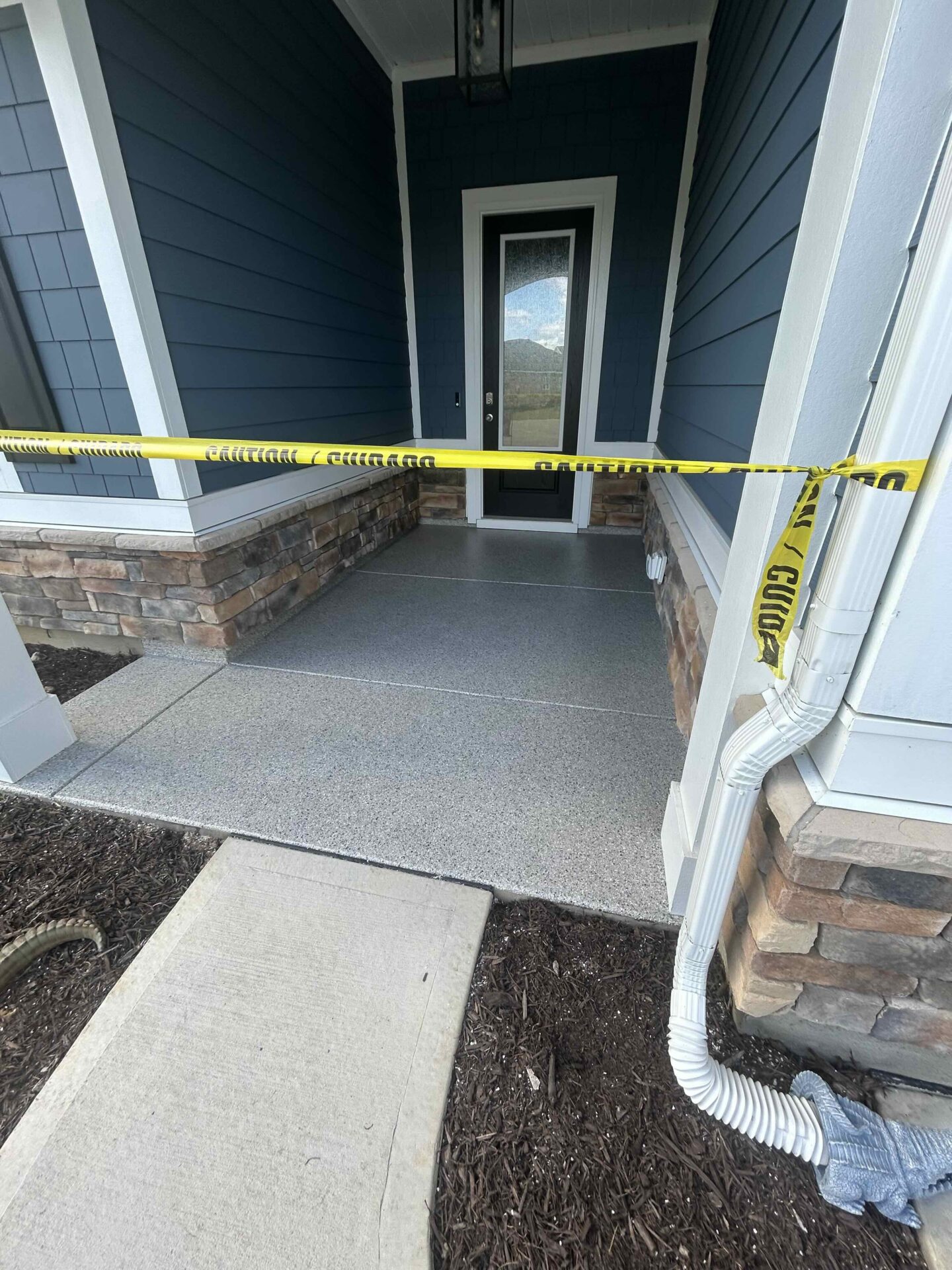 polyaspartic coated porch concrete
