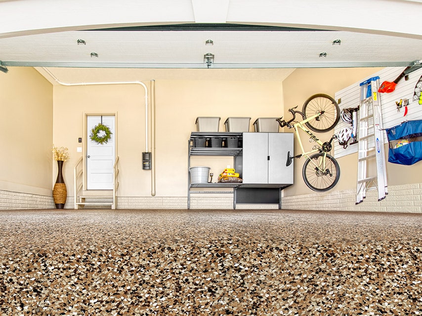 garage with concrete floor coating and garage storage | Hello Garage