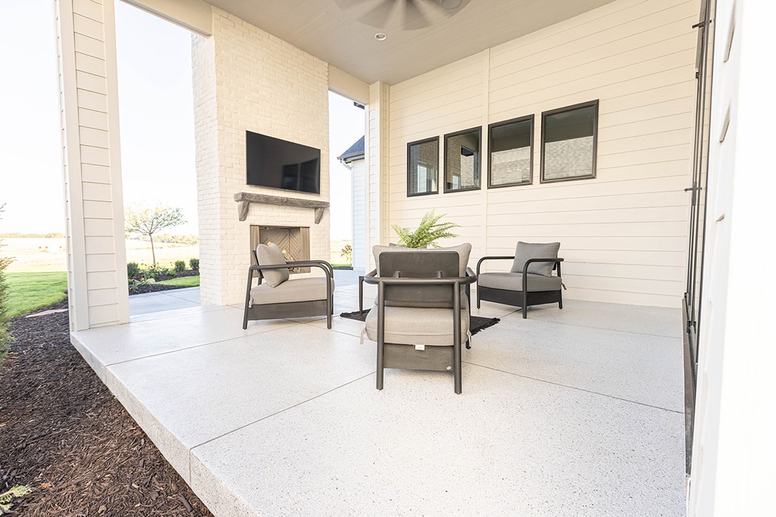Outdoor patio with beige furniture