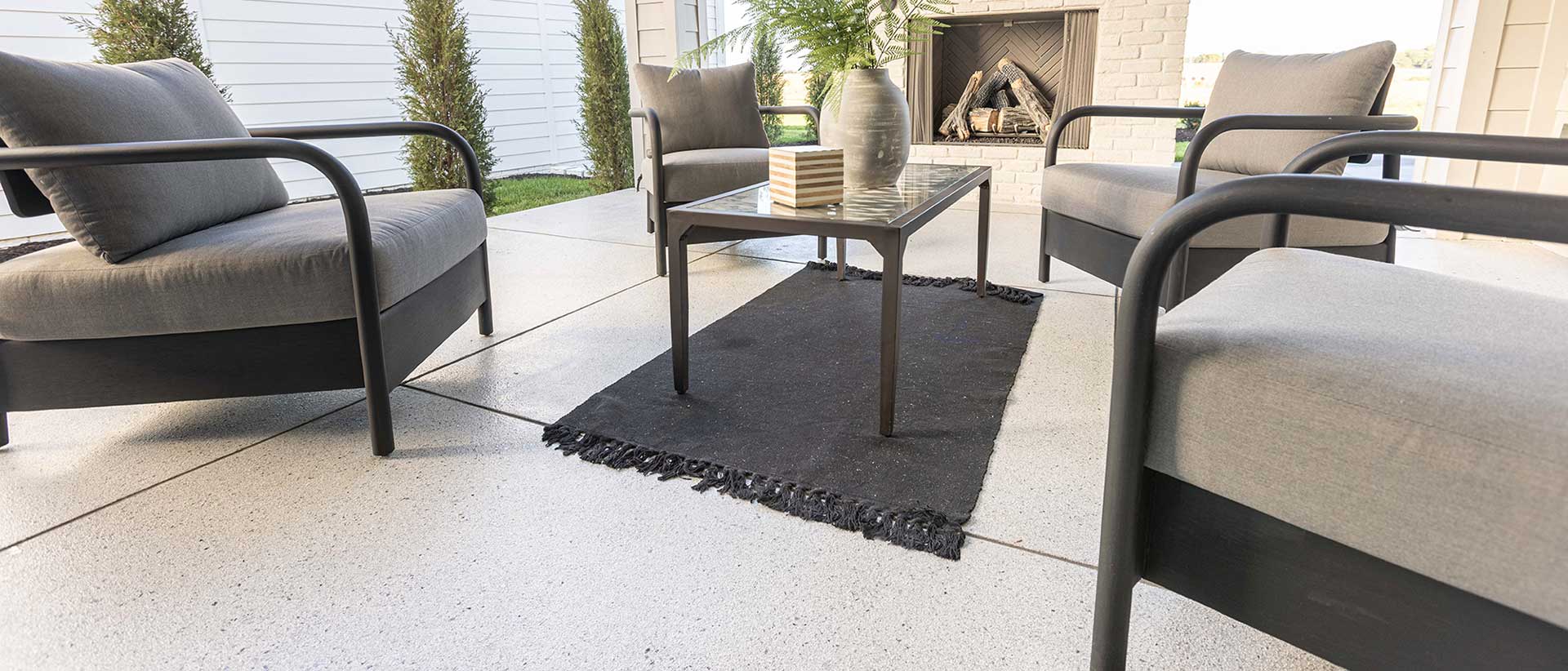 Exterior patio with beige furniture