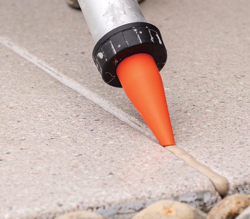 NexusPro® crack sealant is applied to joints and cracks to prevent water damage and complete the look.