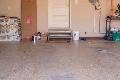 ServiceDetail_PolyureaAlt_PolyureaPolyaspartic_Before dirty garage flooring | Hello Garage