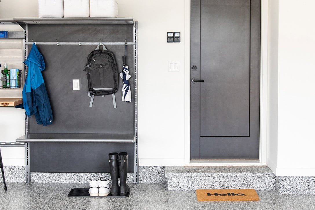 Inside garage door with drop zone and shelving