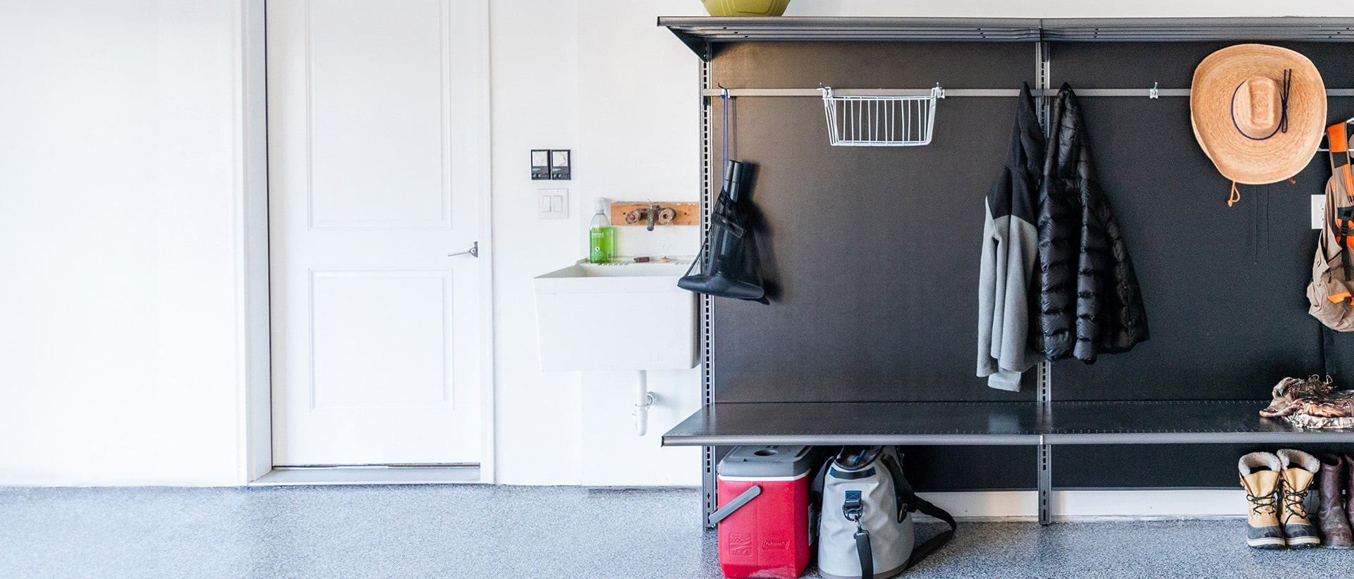 Mudroom drop zone with medal bench