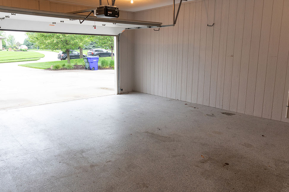 Empty garage with garage door open