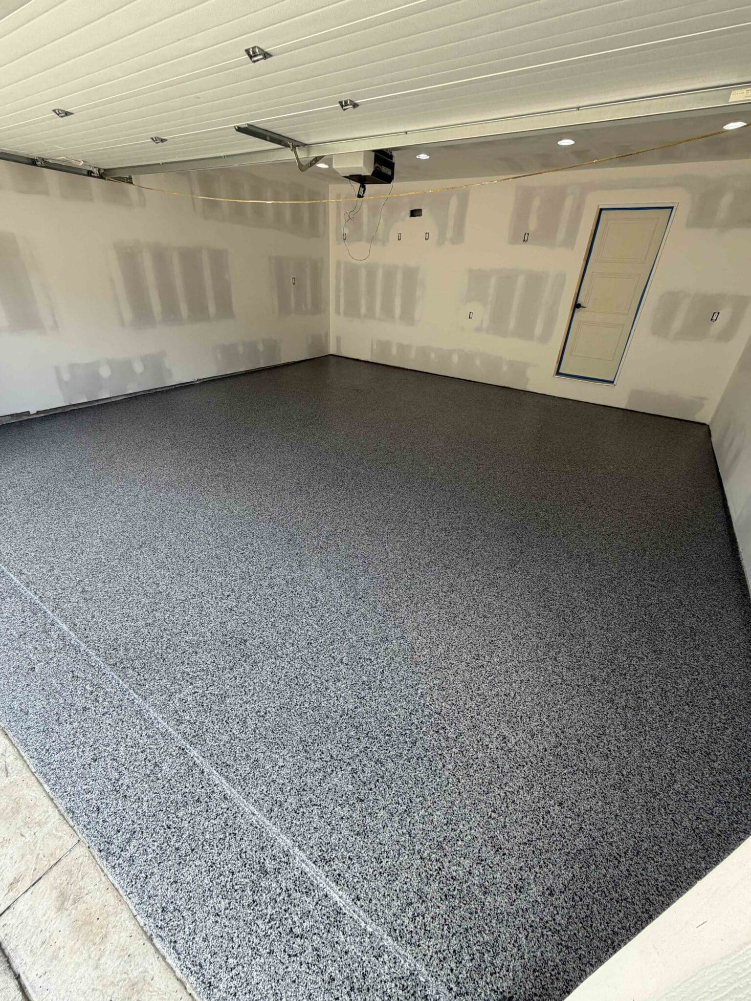 1_KC_Garage_0618_Peppercorn_LeesSummit_A peppercorn garage floor coating