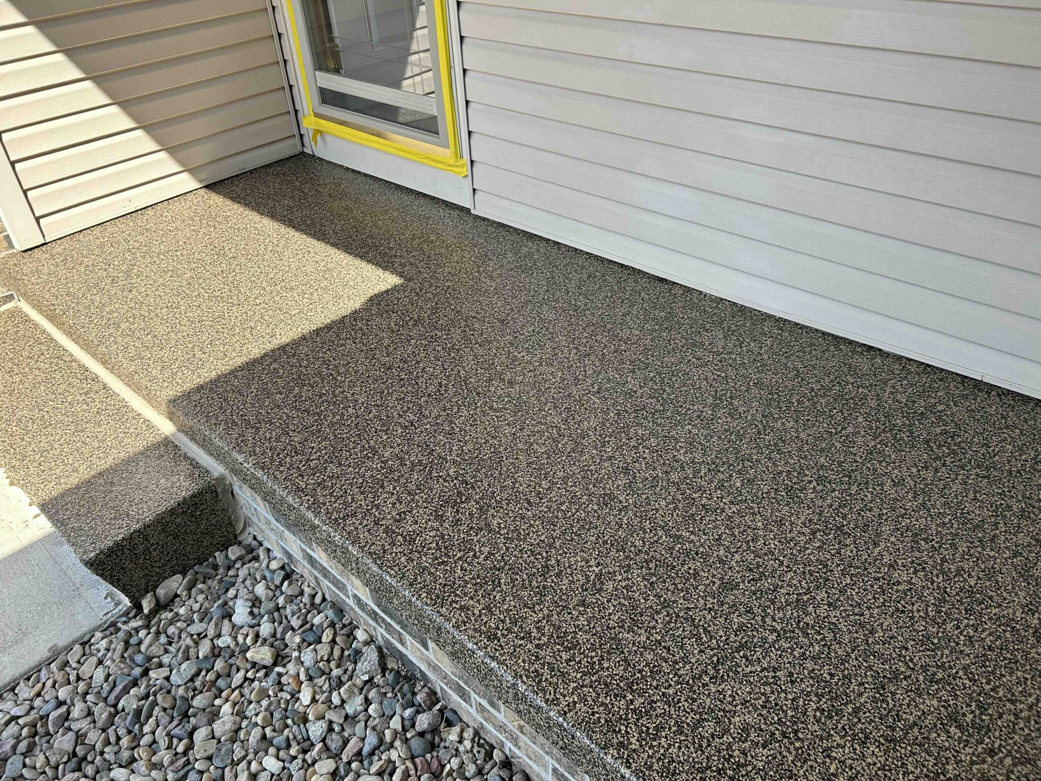 1_Omaha_Porch_0831_Mocha_Fremont_A mocha colored front porch coating