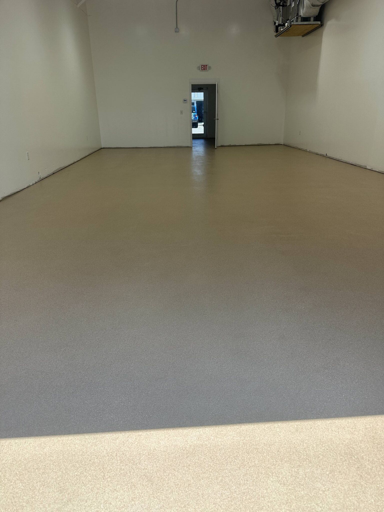 1_Wilmington_Garage_0713_Almond_CarolinaBeach_A almond colored garage floor coating