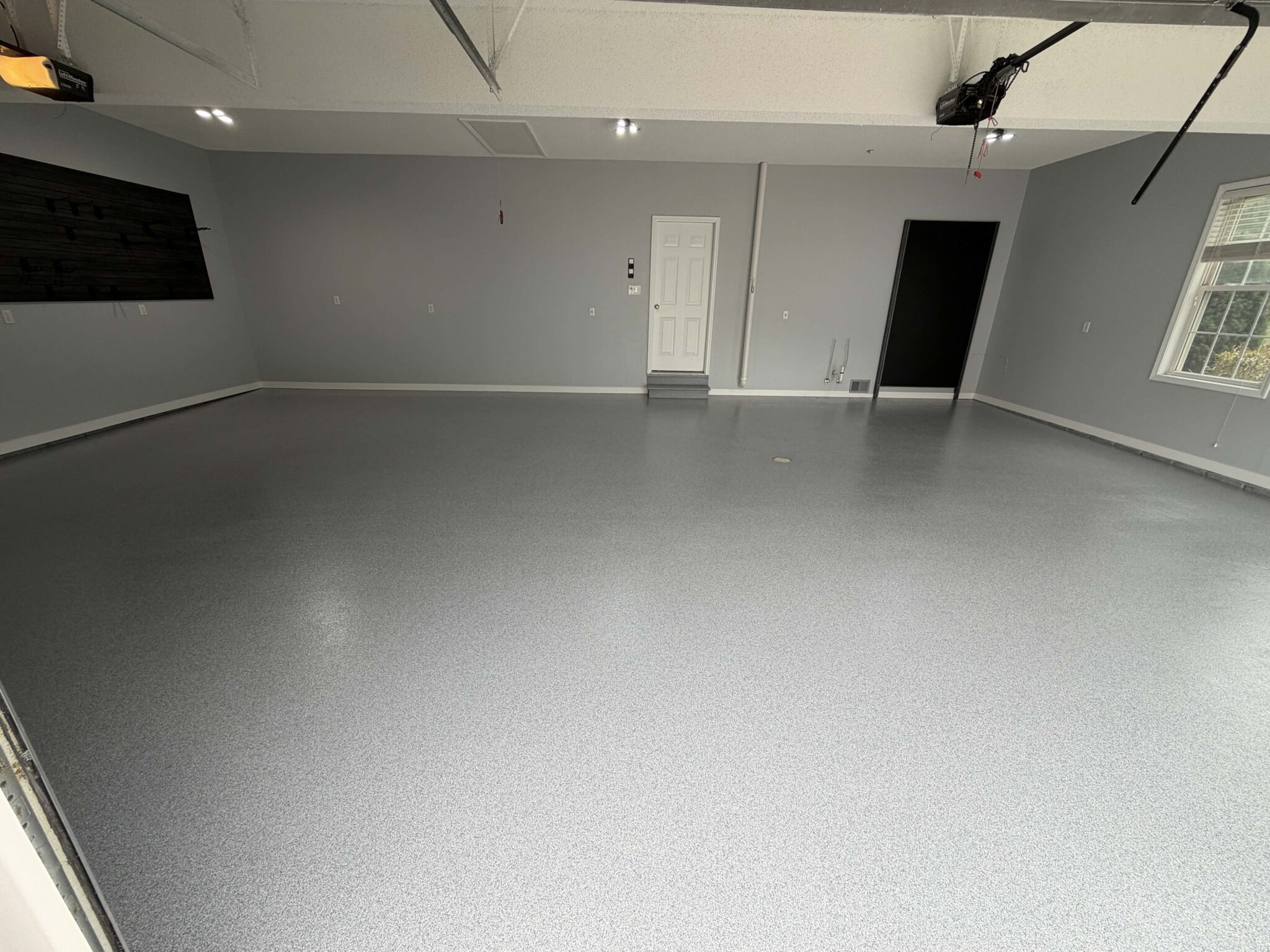 Carbon Install 2 Carbon polyaspartic floor coating