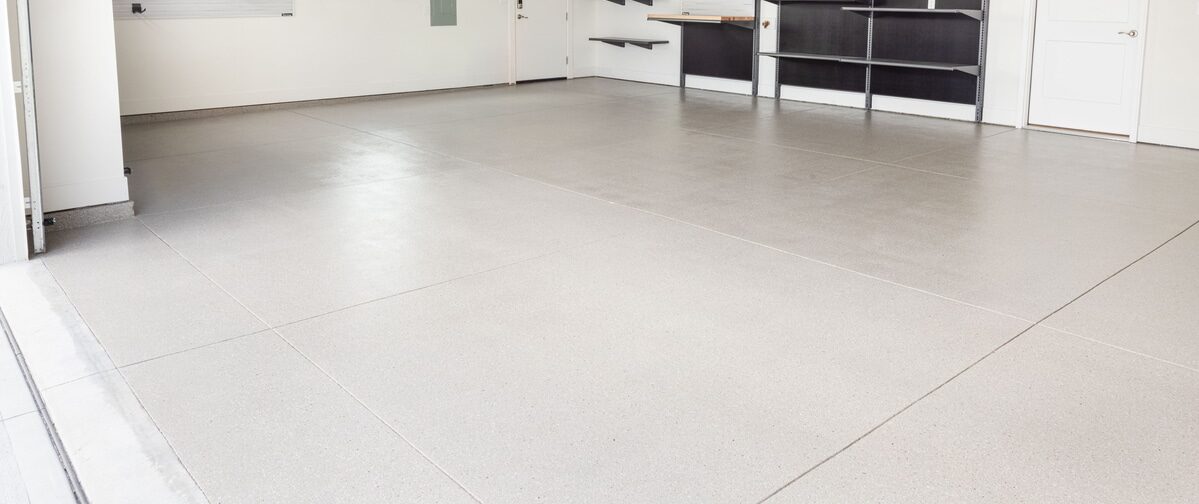 Garage with concrete coating and shelving