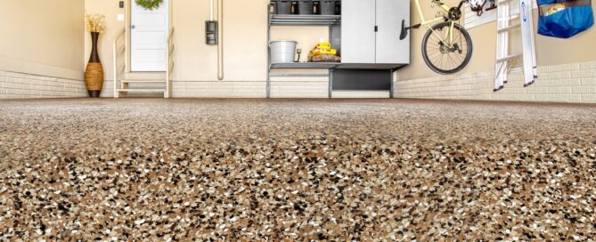 Taupe colored garage floor coating and garage organization