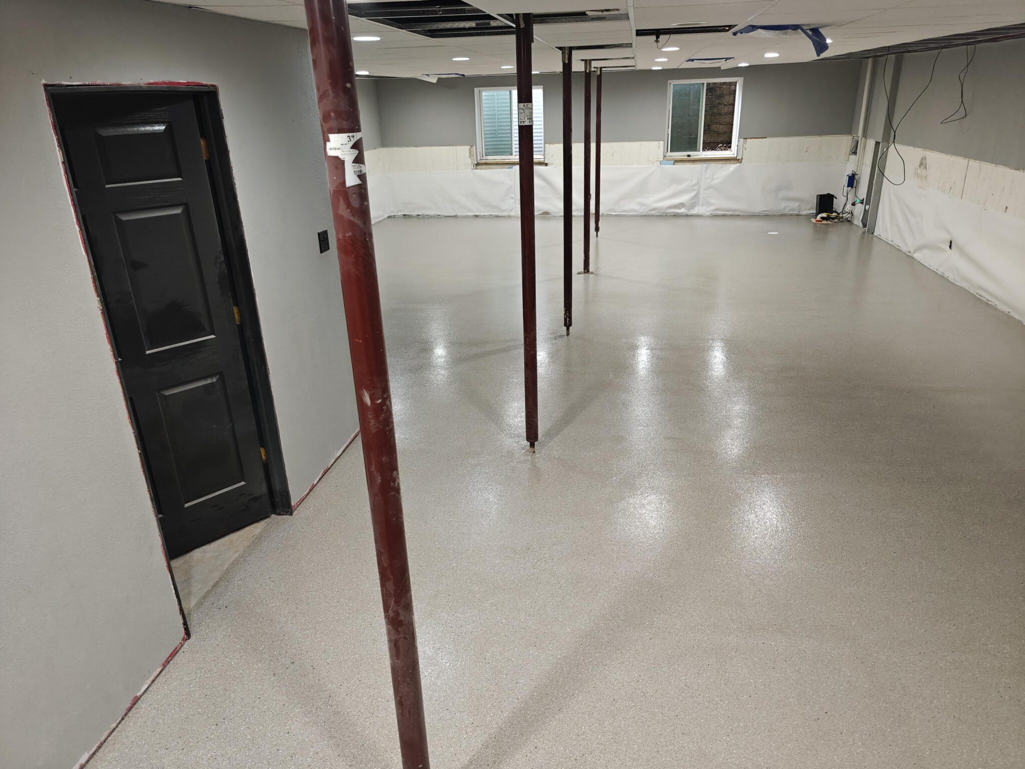 Polyaspartic coated basement concrete