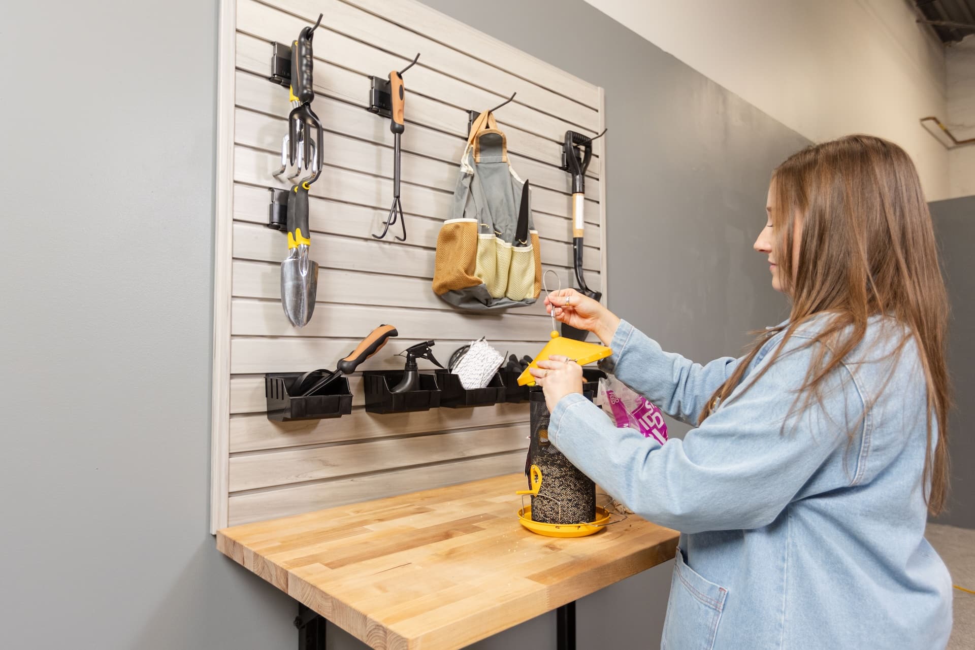 Woman standing at workbench