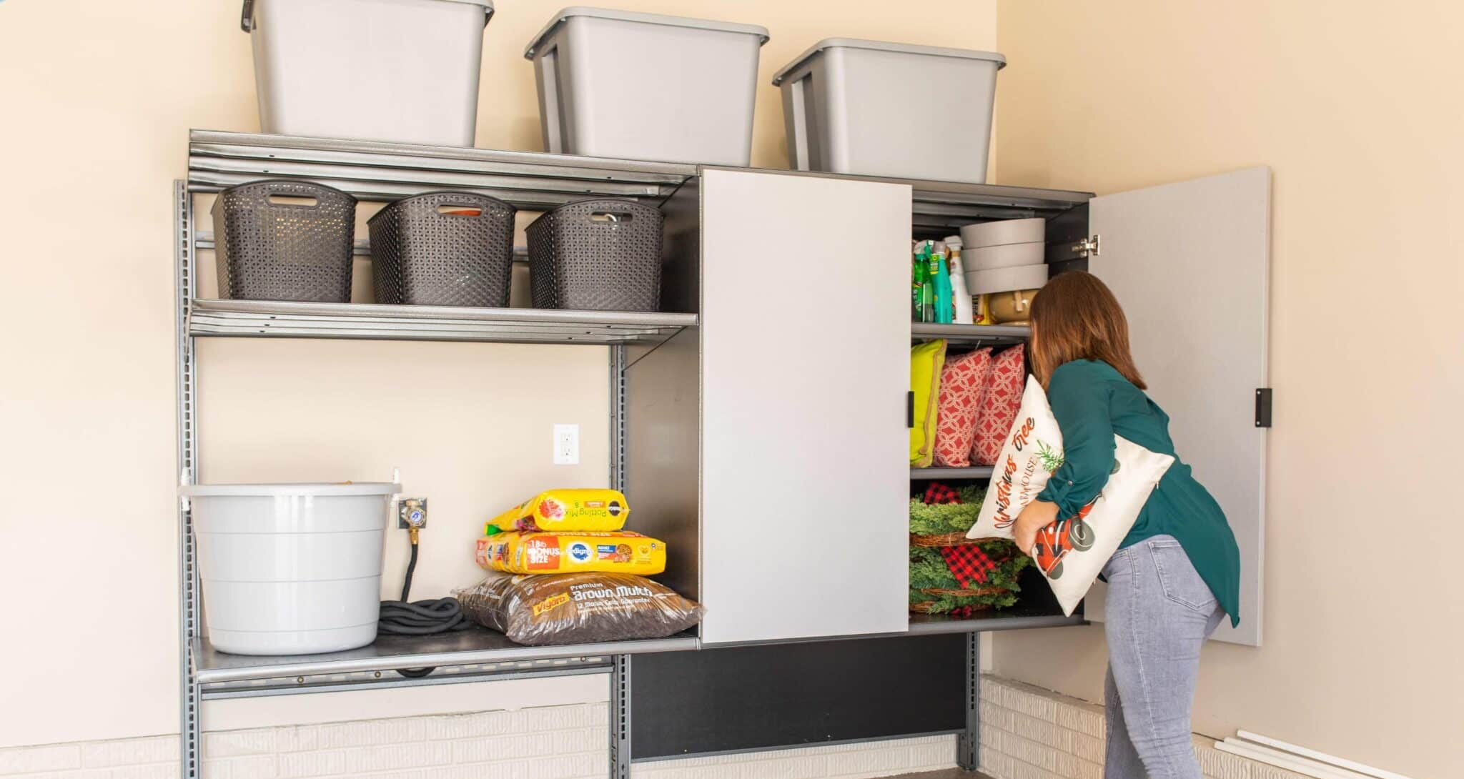 Woman putting things away in cabinet
