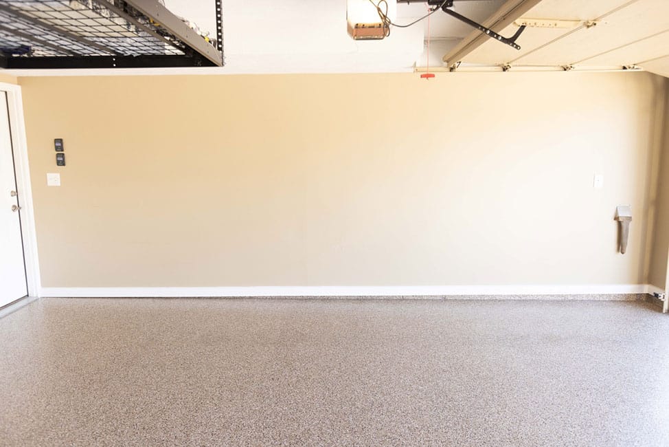 Garage with white baseboards