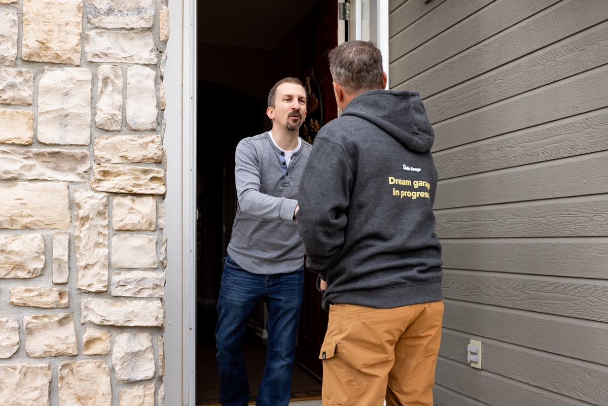 Installer greeting homeowner
